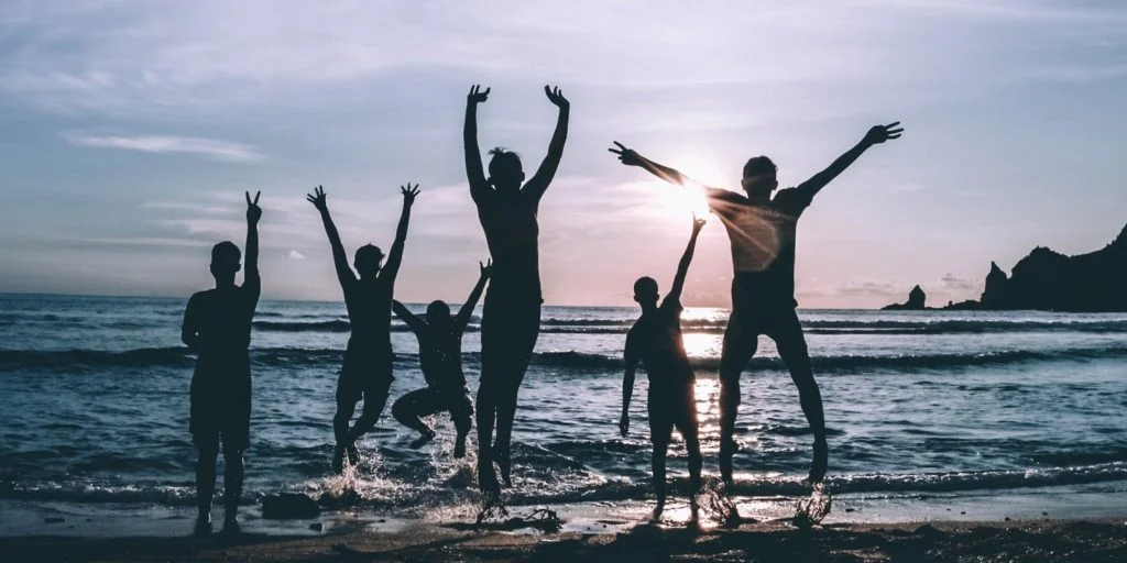 Students enjoying social activities and Brighton beach during summer English course