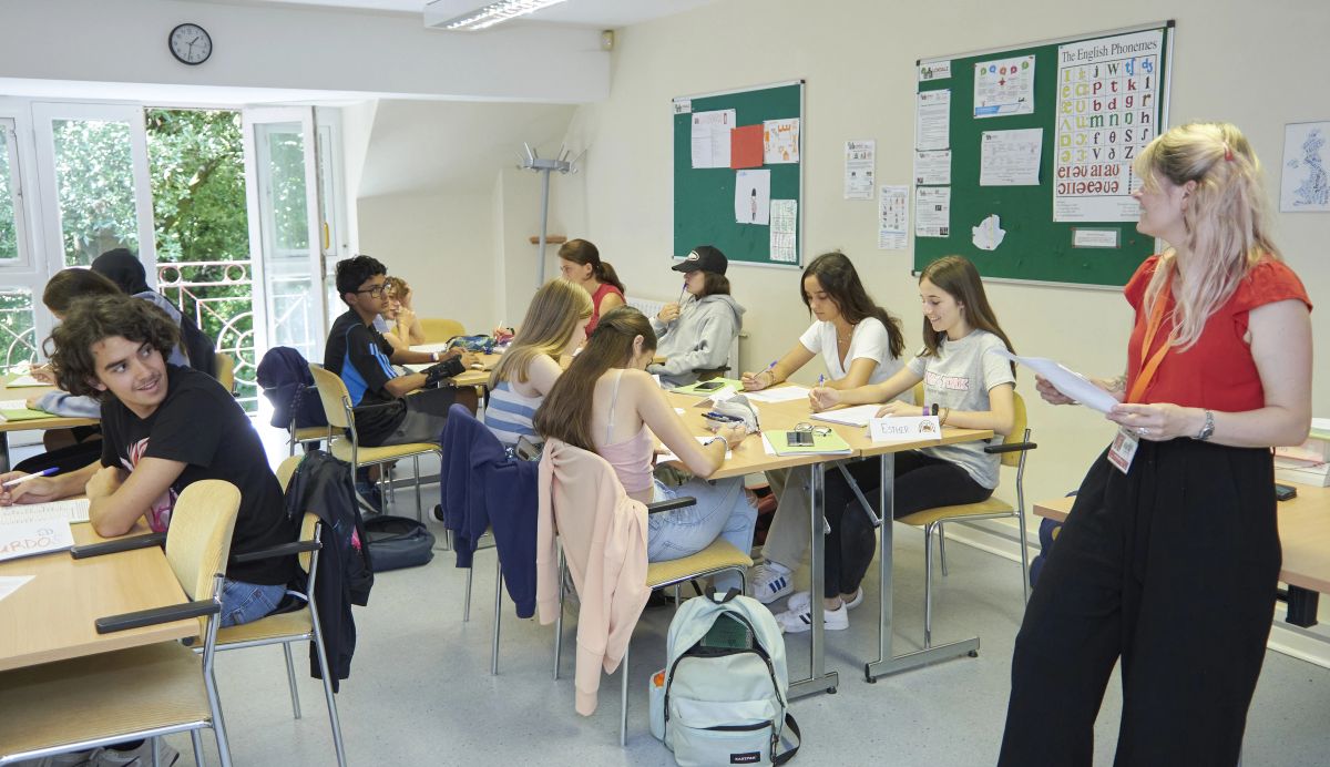 Teenagers in a bright summer school English class at Loxdale English Centre