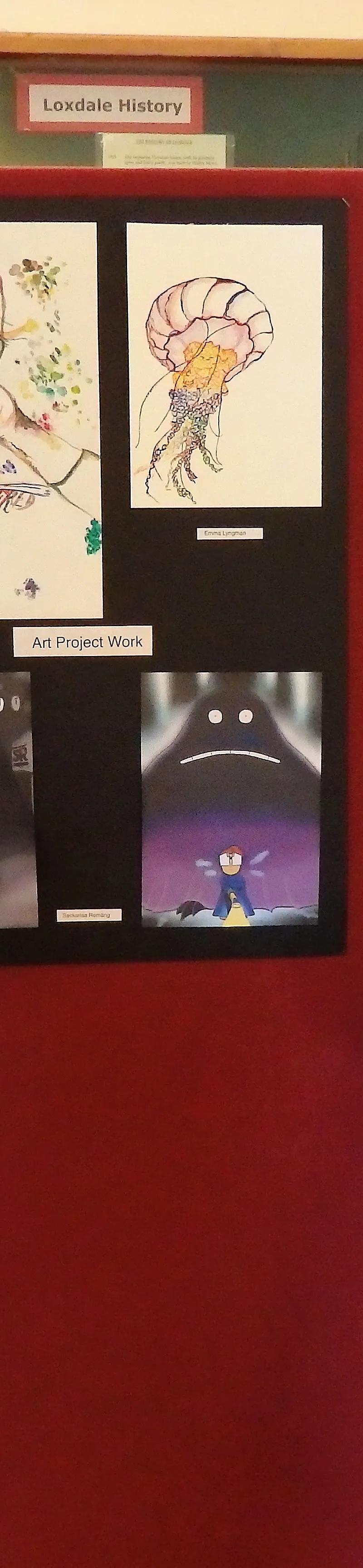 Students presenting artwork at English Plus art exhibition at Loxdale English Centre Brighton