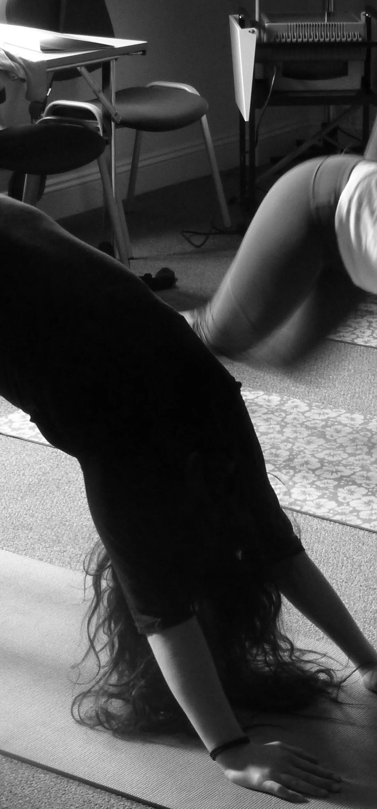 Students practising yoga during the English with Health and Wellbeing course at Loxdale Brighton