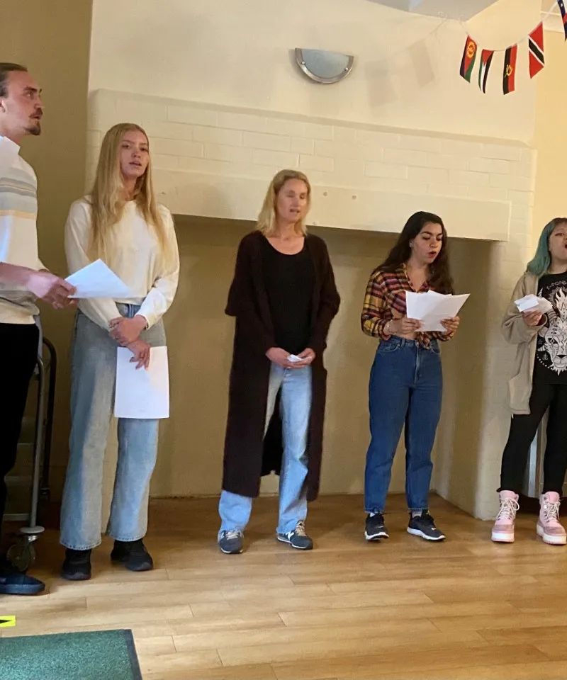 Students performing in English class at Loxdale language school in Brighton, practicing speaking skills