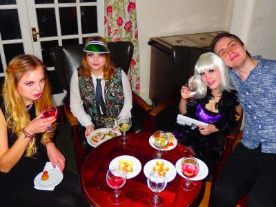 Students in costumes enjoying evening social activities at Loxdale English Centre
