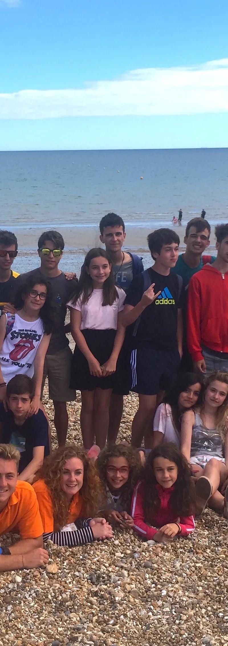 International students enjoying Brighton beach during English language course social activities