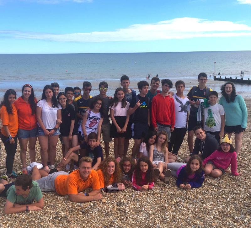 International students enjoying Brighton beach during English language course social activities