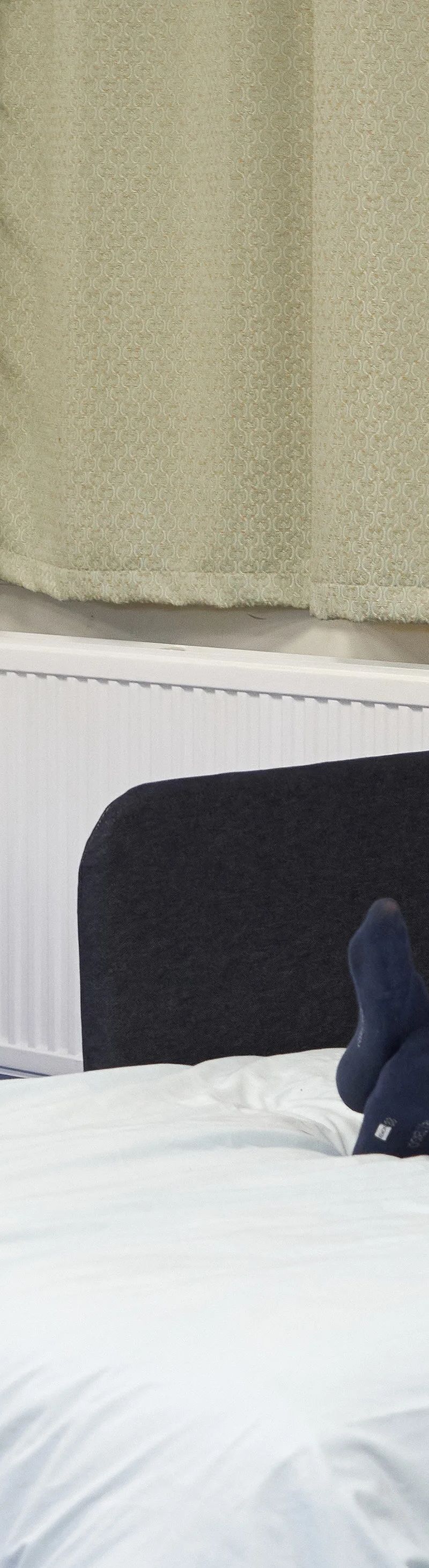 Cosy student bedroom with beds and storage at Loxdale residential