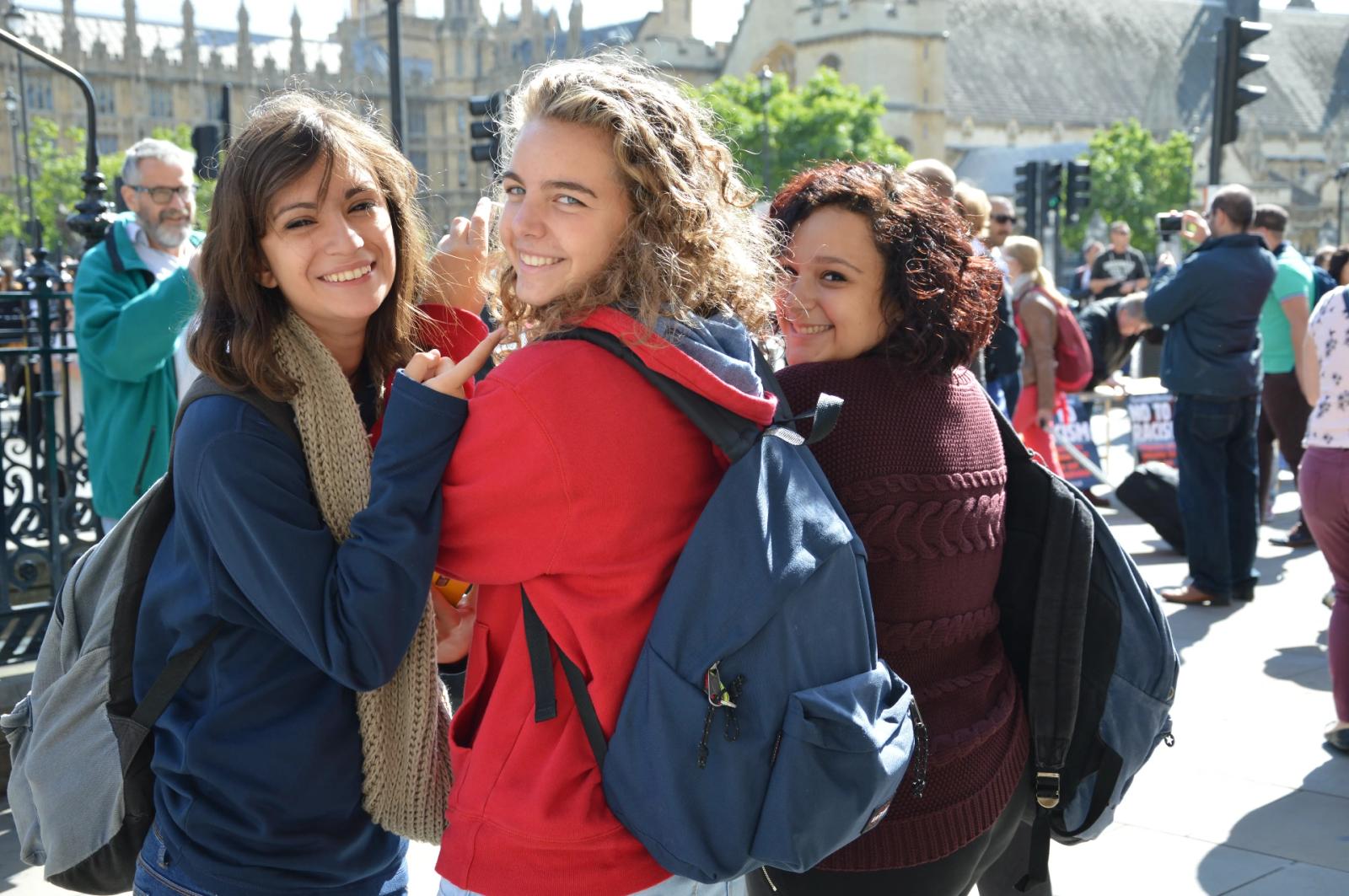 Smiling teenage students in winter coats on a Loxdale excursion